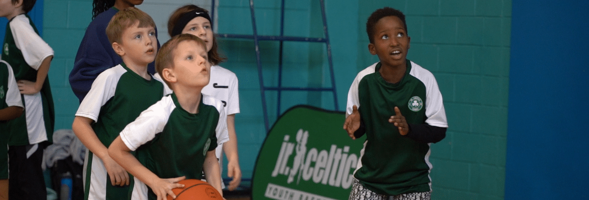 a group of kids in a gym