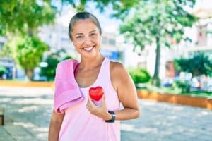 a woman practicing heart health through exercise