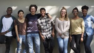Teenagers smiling at a teen event