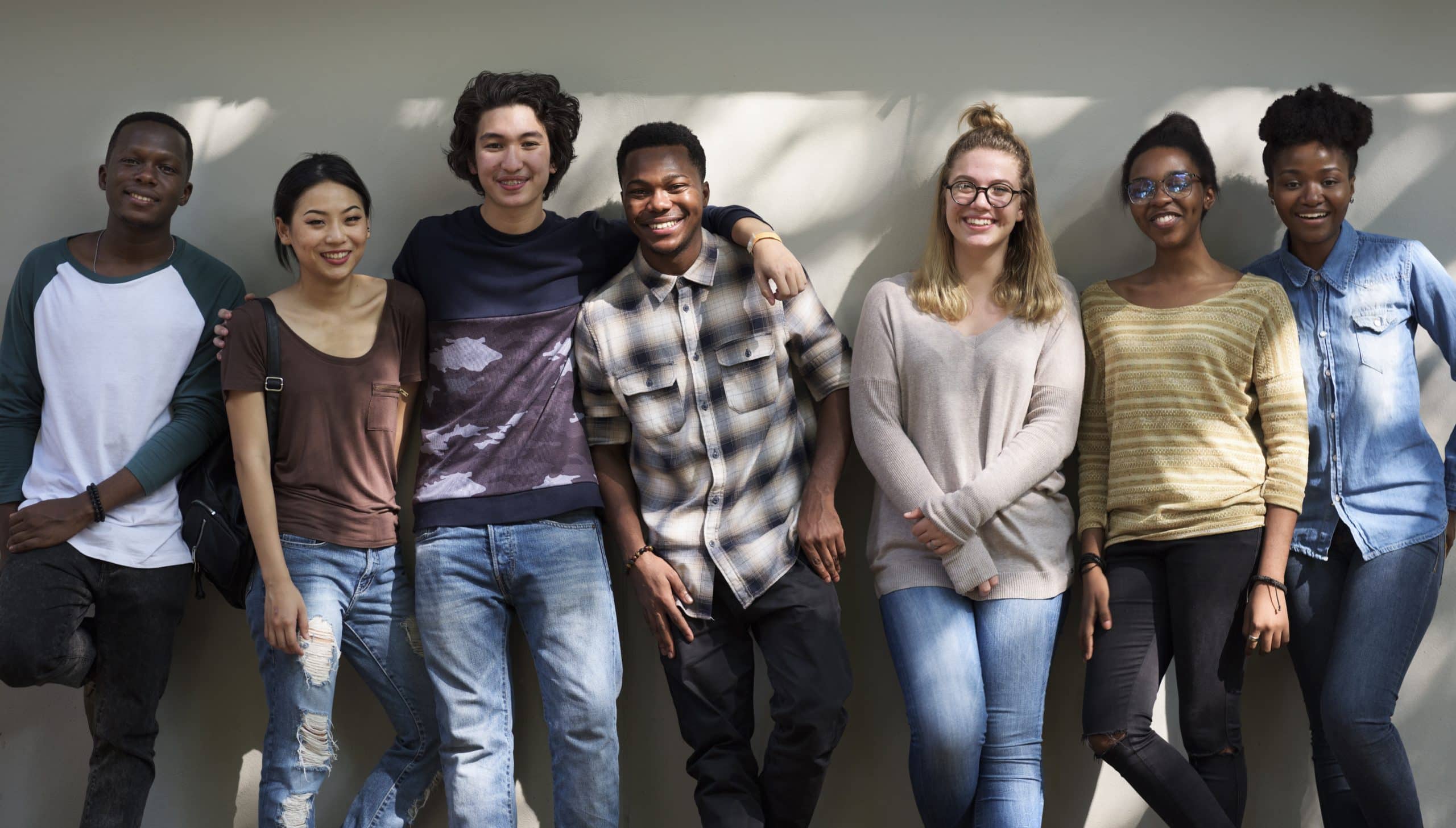 Teenagers smiling at a teen event
